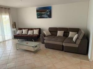 Un lugar para sentarse en logement entier vue sur mer