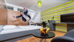 Postel nebo postele na pokoji v ubytování campuszwei - Hotel & Boardinghouse