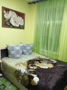 
Кровать или кровати в номере Hostel Den' & Noch'

