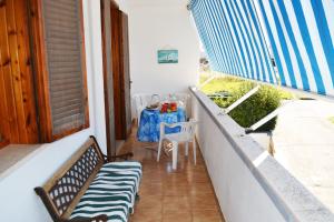 Balkón alebo terasa v ubytovaní Casa vacanza vicino spiaggia-ll23