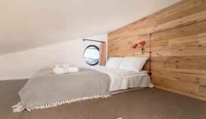 Voodi või voodid majutusasutuse Kazbegi cabins toas