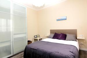 Una cama o camas en una habitación de RIUS - Modern apartment in the Montjuic