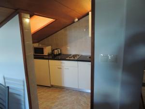 Kuchyň nebo kuchyňský kout v ubytování Apartments Suljic - Cash Only Property