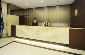 Členové personálu v ubytování F Hotel - Hualien