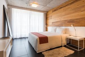Postel nebo postele na pokoji v ubytování Costa Colonia - Riverside Boutique Hotel