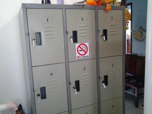 a group of lockers with a sign on them at Star Dormitory in Haad Rin