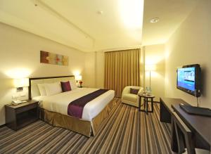 Postel nebo postele na pokoji v ubytování F Hotel - Hualien