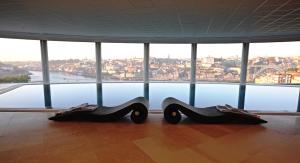 two large black shoes sitting on the floor of a building at The Yeatman in Vila Nova de Gaia