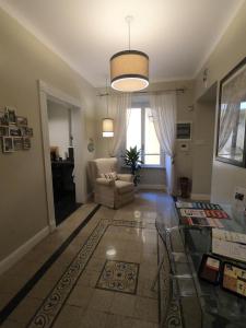 Ein Sitzbereich in der Unterkunft Residenza Roma Imperiale