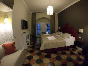 Ein Bett oder Betten in einem Zimmer der Unterkunft Residenza Roma Imperiale