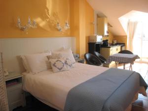 Postel nebo postele na pokoji v ubytování Boutique Hotel Pueblo