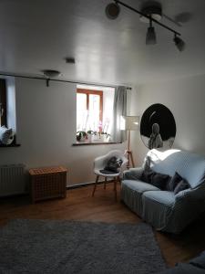 Postel nebo postele na pokoji v ubytování fewoflagmeier Kohlstetten I Alte Backstube