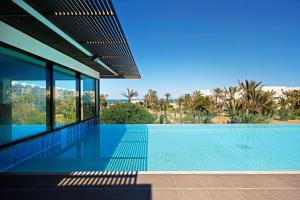 Bazén v ubytování Radisson Blu Palace Resort & Thalasso, Djerba nebo v jeho okolí