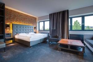Postel nebo postele na pokoji v ubytování Park Inn by Radisson Lübeck + 37 fotografií