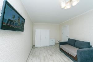 Televízia a/alebo spoločenská miestnosť v ubytovaní New apartment on Starokyivska 1/5