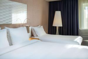 Krevet ili kreveti u jedinici u okviru objekta Radisson Blu Scandinavia Hotel Aarhus