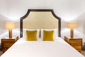 Voodi või voodid majutusasutuse Radisson Blu Hotel, London South Kensington toas