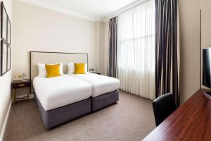 Televiisor ja/või meelelahutuskeskus majutusasutuses Radisson Blu Hotel, London South Kensington