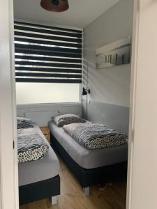 Cama o camas de una habitación en Van Dijk Apartments
