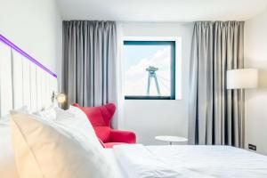 Postel nebo postele na pokoji v ubytování Park Inn by Radisson Danube Bratislava