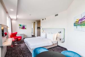 Postel nebo postele na pokoji v ubytování Park Inn by Radisson Danube Bratislava