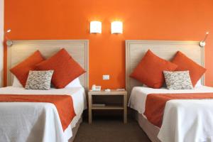 Letto o letti in una camera di Hotel Flamingo Irapuato