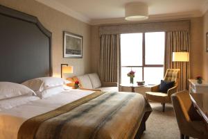 Voodi või voodid majutusasutuse Radisson Blu St. Helen's Hotel toas