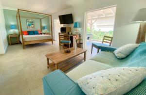 Giường trong phòng chung tại LES HAUTS DU CAP