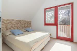 Postel nebo postele na pokoji v ubytování Apartma Natura
