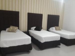 Postel nebo postele na pokoji v ubytování Hotel Boutique Casa Umiña