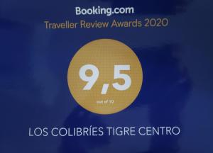 a yellow circle with the number on it at Los Colibries Tigre Centro in Tigre