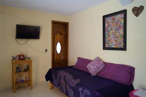Letto o letti in una camera di J&K Suite