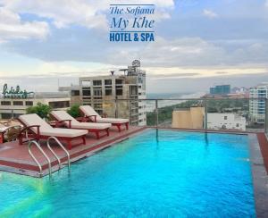 a swimming pool on the roof of a building at Sofiana My Khe Hotel & Spa- Rooftop Pool Bar in Danang