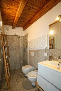 a bathroom with a toilet and a sink and a shower at Il Cuoco Pescatore, Ittiturismo Lecardònaie du Pescòu in Recco +28 photos