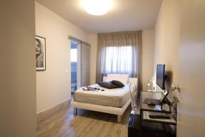 Postel nebo postele na pokoji v ubytování B&B EL DUCHE
