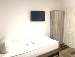 Postel nebo postele na pokoji v ubytování Grüner Baum