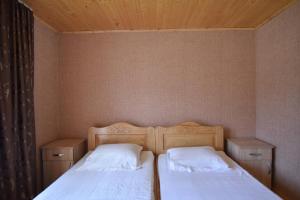Letto o letti in una camera di Saba
