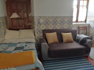 Postel nebo postele na pokoji v ubytování Casa da Lomba