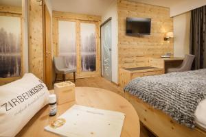 Postel nebo postele na pokoji v ubytování Hotel Weinbauer
