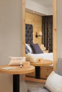 Postel nebo postele na pokoji v ubytování Hotel Weinbauer