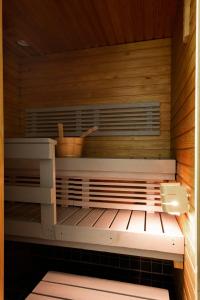 a sauna with a bowl on top of it at 2ndhomes Katajanokka Apartment with Seaview and Sauna in Helsinki