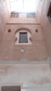 an empty room with a window in a building at Hotel Aday in Marrakesh