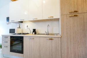Kuchyňa alebo kuchynka v ubytovaní G&B apartment