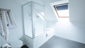 Koupelna v ubytování Hotel Elite