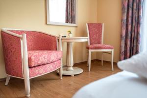 Łóżko lub łóżka w pokoju w obiekcie Erlenhof B&B