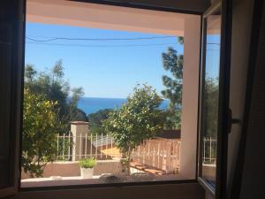 a window view of the ocean from a house at B&B Villa Rosa Angrisano in Maratea +12 photos