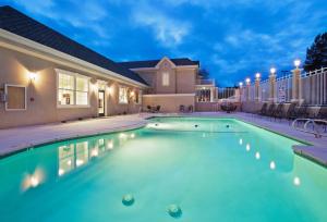 a swimming pool in the backyard of a house at Holiday Inn Redding by IHG in Redding