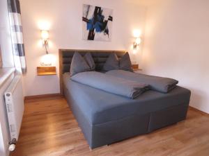 מיטה או מיטות בחדר ב-Appartement Pichler