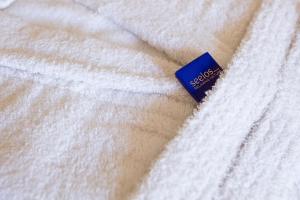 Łóżko lub łóżka w pokoju w obiekcie Hotel Seelos
