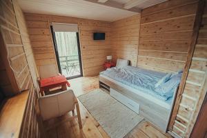 Posteľ alebo postele v izbe v ubytovaní Zacisze Leśne nad Pilicą